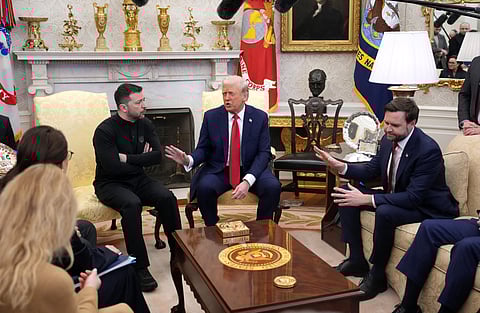 WASHINGTON, DC - U.S. President Donald Trump (C) and Vice President JD Vance meet with Ukrainian President Volodymyr Zelensky in the Oval Office at the White House on 28 February 2025 in Washington, DC. Trump and Zelensky are meeting today to negotiate a preliminary agreement on sharing Ukraine’s mineral resources that Trump says will allow America to recoup aid provided to Kyiv while supporting Ukraine’s economy.