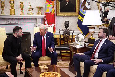 WASHINGTON, DC - U.S. President Donald Trump (C) and Vice President JD Vance meet with Ukrainian President Volodymyr Zelensky in the Oval Office at the White House on 28 February, 2025 in Washington, DC. Trump and Zelensky are meeting today to negotiate a preliminary agreement on sharing Ukraine’s mineral resources that Trump says will allow America to recoup aid provided to Kyiv while supporting Ukraine’s economy.