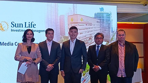 SLIMTC president Michael Enriquez (second from left) and portfolio manager Patrick Ella (rightmost) discussed the company’s economic outlook for this year during a media briefing on Friday at Makati Shangri-La.