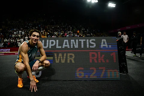 Armand Duplantis smiles after completing a record-breaking performance of 6.27 meters in the All-Star Pole Vault in Clermont-Ferrand, France.
