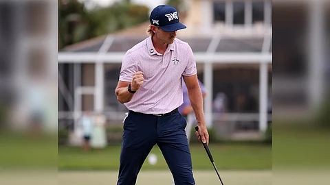 Jake Knapp celebrates after sinking a birdie putt on the 16th green during the third round of the Cognizant Classic at Palm Beach Gardens in Florida.