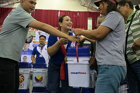 PCSO distributes 1K food buckets, educational grants in Malolos