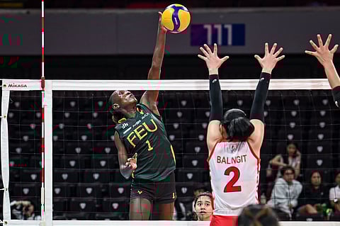 Faida Bakanke delivers a powerful attack to help FEU post 25-23, 25-19, 25-20 victory over UE in Season 87 UAAP women’s volleyball tournament yesterday at the Mall of Asia Arena.