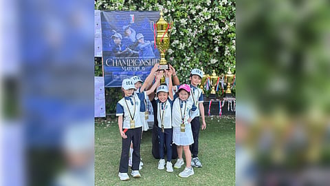 Members of the Immaculate Conception Academy hoist the championship trophy after topping the Lower School division of the JGFP Interschool Match Play Championship at Mt. Malarayat Golf and Country Club in Lipa, Batangas.