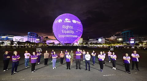 Leading the illumination: SM Cares Program Director for Women Atty. Pearly Joan Turley, Philippine Commission on Women (PCW) Chairperson Ermelita Valdeavilla, SM Supermalls Executive Vice President for Marketing Jonjon San Agustin, and United Nations Population Fund (UNFPA) Assistant Country Representative Jose Roi Avena light up the SM Mall of Asia Globe in purple to celebrate Women's Month this March.