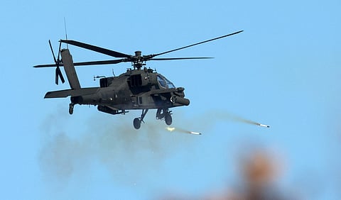 A South Korean Apache helicopter fires rockets during a joint live-fire drill between South Korea and the United States at the Seungjin Fire Training Field in Pocheon on 6 March 2025.