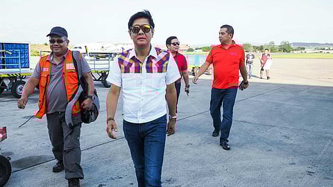 Then-vice presidential candidate Bongbong Marcos (BBM), followed by Rep. Martin Romualdez, arrives at Davao International Airport on 8 May 2016 to meet with then-Mayor Rodrigo Duterte and his daughter, then-Vice Mayor Sara Duterte.