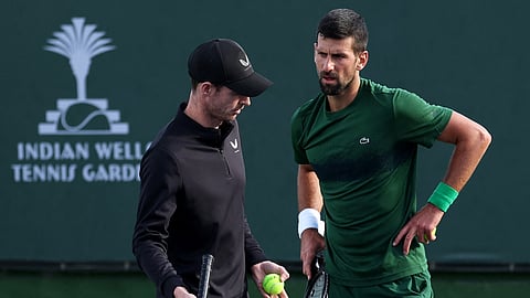 Novak Djokovic gets pointers from his new coach, Andy Murray, during a practice session ahead of the Indian Wells ATP Masters.