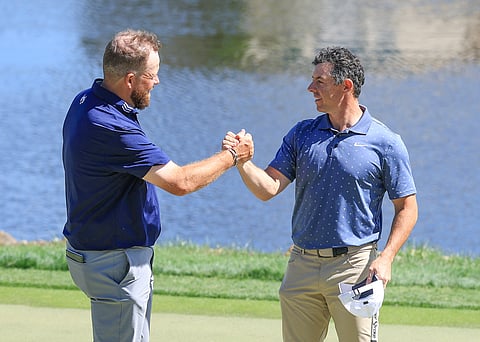 Shane Lowry (left) enjoys playing with Rory McIlroy, helping him fire a five-under-par 67 for a two-shot lead in the second round of the Arnold Palmer Invitational in Orlando.