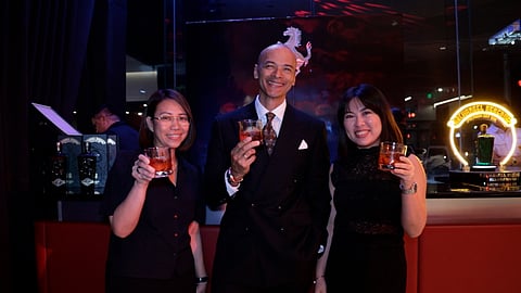GSMI’s Vera Bautista, Paolo Abrera and Ranzel Poblete toast with Rosso 12 cocktails at the Ferrari 12Cilindri launch. Shown are: (from left) Vera Bautista, GSMI New Product Development manager; Paolo Abrera, gin enthusiast and host, and Ranzel Poblete, GSMI New Product Development assistant.
