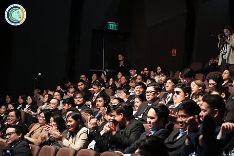 Senior high school and college students of De La Salle-College of Saint Benilde listen to Secretary Robert E.A. Borje, vice chairperson and executive director of CCC, during the 26th Benilde Model United Nations Conference.