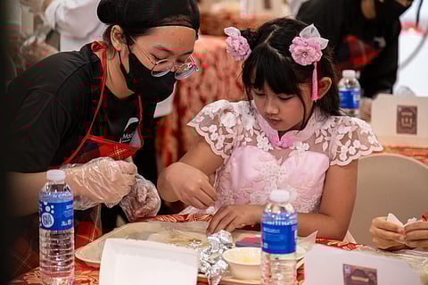 Participants at Tikoy 101 dive into the rich cultural heritage of the Chinese New Year by learning about tikoy, its symbolism, and how it brings families together for prosperity and good fortune. This hands-on session at Book Nook celebrates culture, storytelling, and the joy of shared traditions.