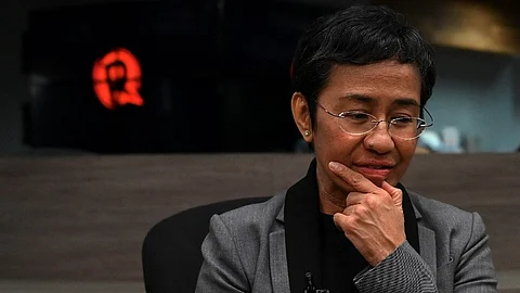 Philippine journalist and Nobel laureate Maria Ressa speaks during an interview with AFP in Manila on September 12, 2023. Ressa was cleared on September 12 of tax evasion following a five-year legal battle, hailing the verdict as a win for press freedom and voicing hope she will be cleared of other charges she insists are politically motivated. (Photo by JAM STA ROSA / AFP)