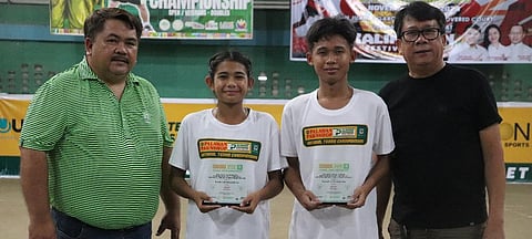 Justine Zaia Gumbao (second from left) and Kurt Alcantara display their trophies as they pose alongside Rex Bentillo (left) and sports coordinator Jonix Paniagua after emerging as the top performers in the opening leg of the three-stop Mindanao swing of the PPS-PEPP National Junior Tennis Circuit in Isulan, Sultan Kudarat.