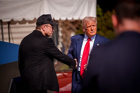 U.S. President Donald Trump and White House Senior Advisor, Tesla and SpaceX CEO Elon Musk shake hands after looking at Tesla vehicles on the South Lawn of the White House on March 11, 2025 in Washington, DC. Trump spoke out against calls for a boycott of Elon Musk's companies and said he would purchase a Tesla vehicle in what he calls a 'show of confidence and support' for Elon Musk.