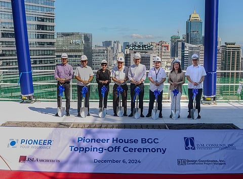 In the photo are (from L to R) Earl Ferrer, Pioneer Shared Services Head; Sonny Salvacion, DCI President; Betty Medialdea, Pioneer Insurance President and CEO; Jorge Consunji, DMCI President and CEO; Lorenzo Chan Jr., Pioneer Group Head; Arch. Jesi Ling, JSLA Senior Architect; Tina de Guzman, Pioneer Shared Financials Head; Jeremy Coyukiat, Pioneer Real Estate Development and Management Head.
