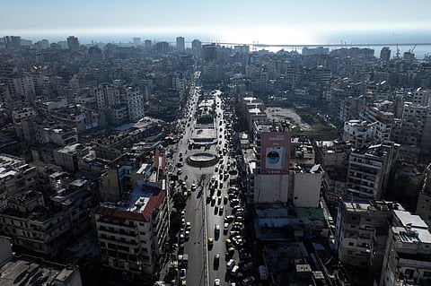 This aerial photograph shows a partial view of Syria's coastal city of Latakia on 12 March 2025. At least 1,383 civilians, the vast majority of them Alawites, were killed in a recent wave of violence that gripped Syria's Mediterranean coast, a war monitor said on 12 March.