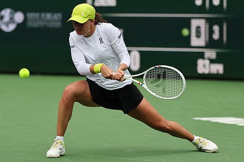 Iga Swiatek exacts revenge on Olympic tormentor Zheng Qinwen 6-3, 6-3 to coast to the semifinals of the Indian Wells ATP Masters in California.