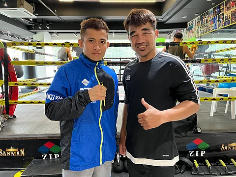 World champ Melvin Jerusalem (left) and chief trainer Michael Domingo are right on the money for the 30 March title defense in Japan.
