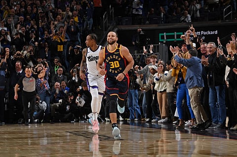 Stephen Curry #30 of the Golden State Warriors celebrates after scoring his 4,000th three point basket during the game against the Sacramento Kings on 13 March, 2025 at Chase Center in San Francisco, California.