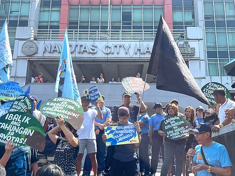 Members of PAMALAKAYA holds a protest in Navotas City over the removal of mussel farms