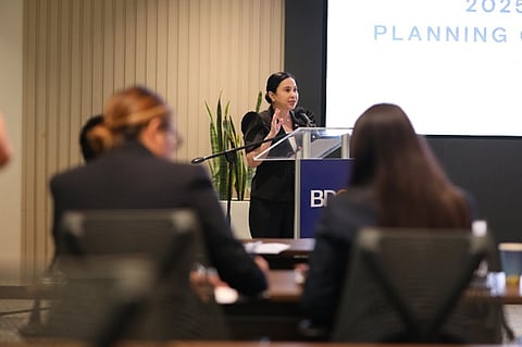 DTI Secretary Cristina Aldeguer-Roque addresses the Foreign Trade Service Corps during the first day of 2025 Planning Conference at BDO Towers in Makati last December 2024.