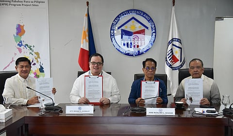 (From left) PCC Executive Director Kenneth Tanate, PCC Chairperson Michael Aguinaldo, DHSUD Secretary Jose Rizalino Acuzar, and DHSUD Legal Service Director Dunstan San Vicente at the ceremonial signing of the memorandum of agreement between the PCC and DHSUD, held at the DHSUD office in Quezon City on 14 March.