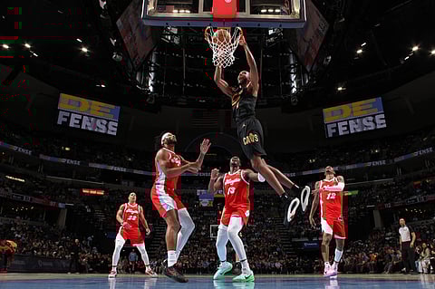 Evan Mobley slam dunks his way to 22 points to lift Cleveland score its franchise record 16th straight win with a 133-124 conquest of the Memphis Grizzlies in their NBA regular season game.