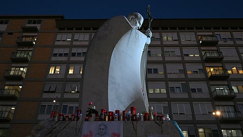 This photograph on 18 March 2025 shows the statue of Pope John Paul the II at the Gemelli Hospital, in Rome where Pope Francis was hospitalized.