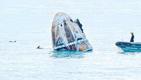 Splashdown The moment of triumph as support teams rush to secure the SpaceX Dragon spacecraft after it splashed down off the coast of Tallahassee, Florida, on Tuesday. Inside, NASA astronauts Butch Wilmore (inset), Nick Hague, Suni Williams and Roscosmos cosmonaut Aleksandr Gorbunov, safely aboard after a historic journey.
