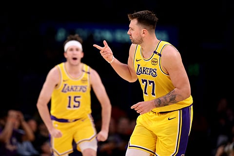 Luka Doncic sizzles with 31 points to power the Los Angeles Lakers to a 120-108 win over the Denver Nuggets in the NBA regular season.