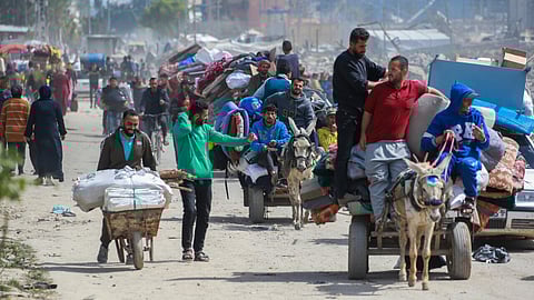 Palestinians leave Beit Hanun in northern Gaza after Israeli evacuation orders