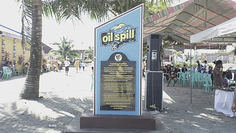 Municipality of Pola unveils a marker to remember the devastating effects of the Verde Island Passage oil spill.
