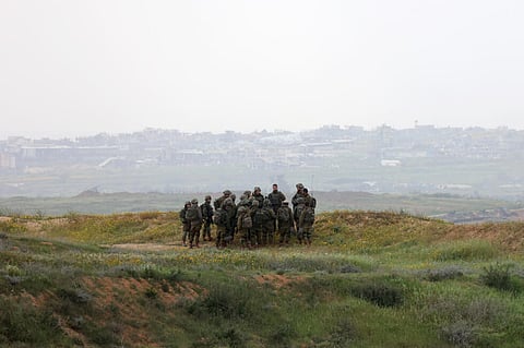 Israeli army soldiers along Israel's southern border with the Gaza Strip on March 20