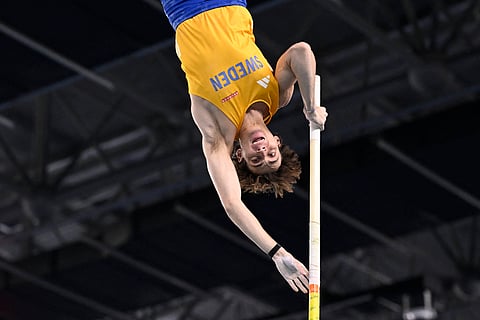 (FILES) Armand ‘Mondo’ Duplantis soars for a 6.15-meter performance to claim his third indoor pole vault title in the World Athletics Indoor Championships in Nanjing, China.