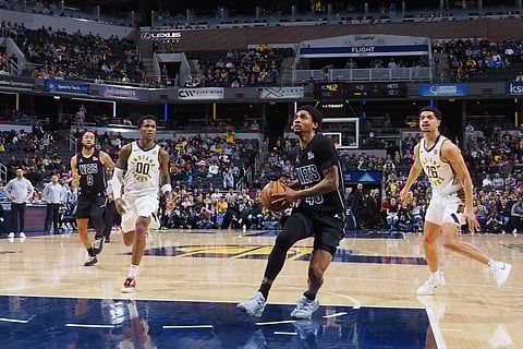 MARCH 22: Keon Johnson #45 of the Brooklyn Nets drives to the basket during the game against the Indiana Pacers on March 22, 2025 at Gainbridge Fieldhouse in Indianapolis, Indiana.
