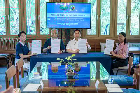 Officials of Philippines Orthopedic Center and Tzu Chi Philippines show the memorandum of agreement they signed on 10 March. They are (from left) TCP deputy CEO Woon Ng, TCP CEO Henry Yuñez, POC Medical Center chief II Dr. Jose Brittanio Pujalte Jr. and POC head of Medical Social Work Department Felicitas T. Zafranco.