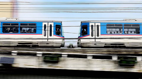 An MRT-3 train is seen passing through Kamuning, Quezon City, on Saturday, 4 January 2025.
