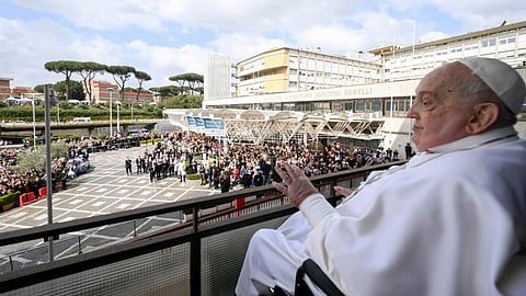 Pope Francis while greeting the crowds gathered at Gemelli Hospital