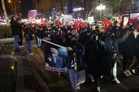 Demonstrators march holding Turkish national flags during a protest following the arrest of the mayor of Istanbul, in Ankara, March 22, 2025. Imamoglu, who is the chief rival of Turkey’s President, was arrested on March 19, 2025, days before he was to be formally named the main opposition CHP’s candidate for the 2028 presidential race.