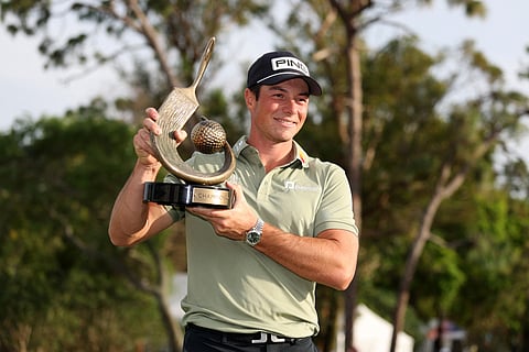VICTOR Hovland lifts the trophy after winning the Valspar Championship for his first US PGA Tour crown since 2023.