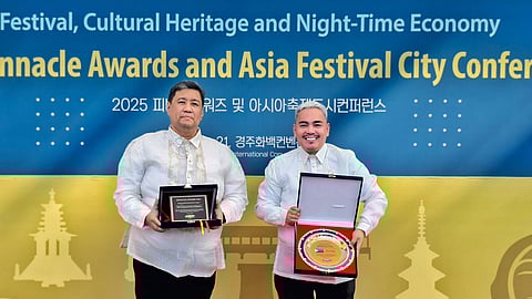 DINAGYANG Festival director Eric Divinagracia and IFFI director for Culture and Arts Initiatives Elvert Bañares proudly receive two prestigious awards for Dinagyang Festival at the International Festivals and Events Association ceremony in South Korea on 21 March.