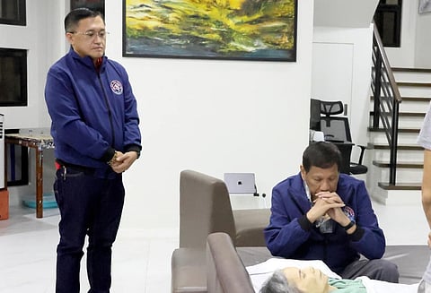 Accompanied by Senator Bong Go, an emotional former president Rodrigo R. Duterte visits the remains of his sister, Jocelyn Duterte-Villarica, who passed away at her home in Cavite on Friday. In her final moments, the former president’s sister was with her two sons, Bambino and Vince. | PHOTOGRAPH courtesy of SBG