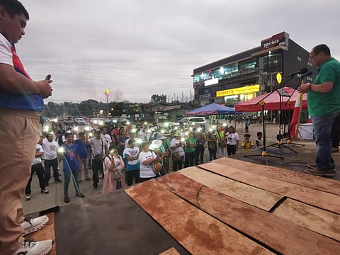 Pro Duterte supporters gather at Rotonda, Tabuk City for prayer and candlelight ceremony for FPRRD.