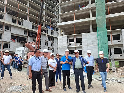 Housing Secretary Jose Rizalino Acuzar (third from right) with key housing officials personally inspecting a housing project in Barangay Batia, Bocaue.