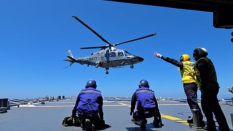 Philippine Navy's AgustaWestland AW109 taking off from the BRP Jose Rizal to conduct Rotary Flight Operations and Maritime Domain Awareness (MDA) near southeast of Bajo de Masinloc (Scarborough Shoal) in the West Philippine Sea on Friday, 28 March 2025. (Photo by Lade Kabagani)