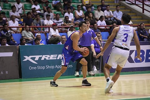Michael Calisaan shows the way for San Juan with 17 points in their 77-72 win over Mindoro in the MPBL.