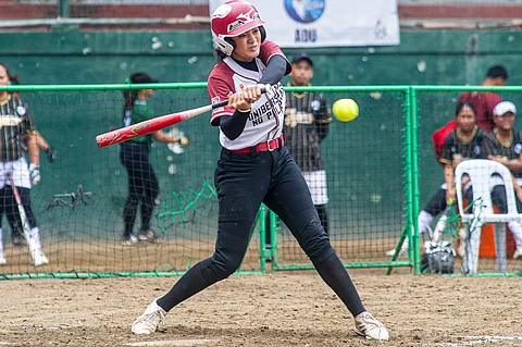 MARTINE Francisco and the UP Fighting Maroons display their championship form to beat the UST Tiger Softbelles in their final elimination round game in the UAAP Season 87 softball tournament.