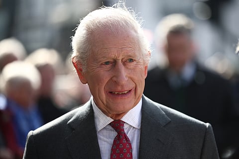 (FILES) Britain's King Charles III meets well-wishers as he arrives with Britain's Queen Camilla to visit the Roe Valley Arts and Cultural Centre, in Limavady, on 20 March 2025, during a three-day trip to Northern Ireland. Britain's King Charles III, on 27 March 2025, was forced to cancel his appointments after suffering "side effects" following his cancer treatment, Buckingham Palace said in a statement.