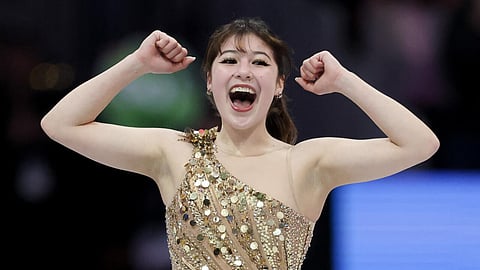 American Alysa Liu reacts after a dazzling free skate on the way to winning the women's figure skating world title